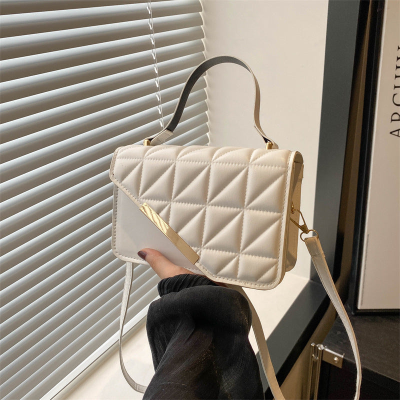 Elegant Quilted Crossbody Bag with Gold Accent