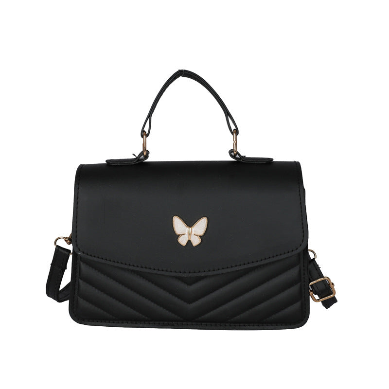 Belvoir Elegant Butterfly Accent Mini Crossbody Bag with Top Handle – Chic and Compact Design