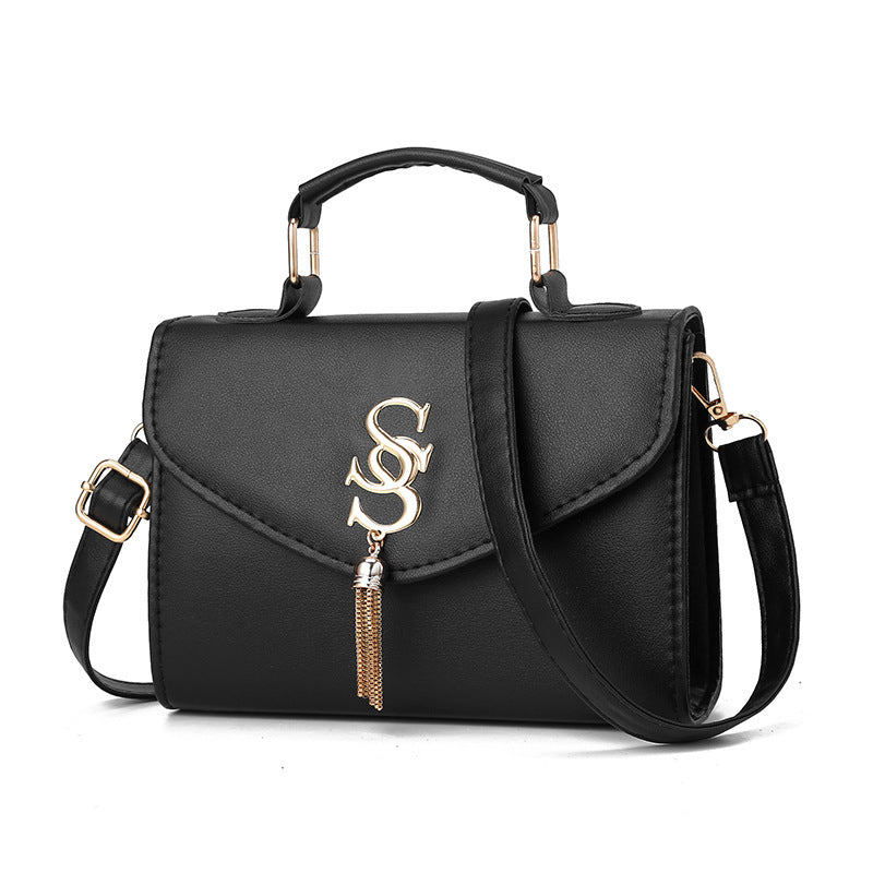 Belvoir Chic Black Handbag with Gold-Tone Accents and Tassel Charm